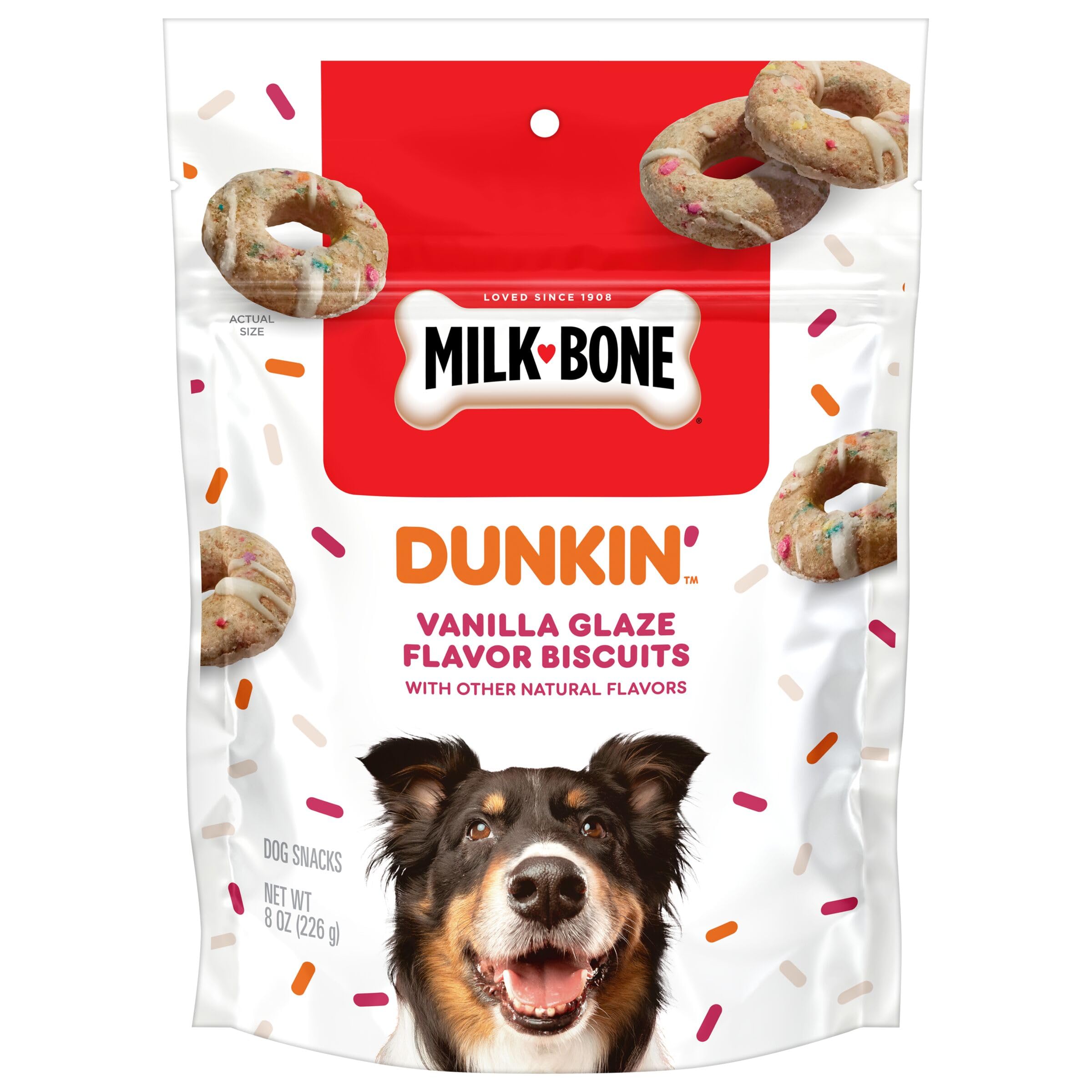 A bag of Milk-Bone Dunkin’ Vanilla Glaze Flavor Biscuits for dogs, featuring an image of a happy dog and biscuit shapes with colorful sprinkles on the packaging.
